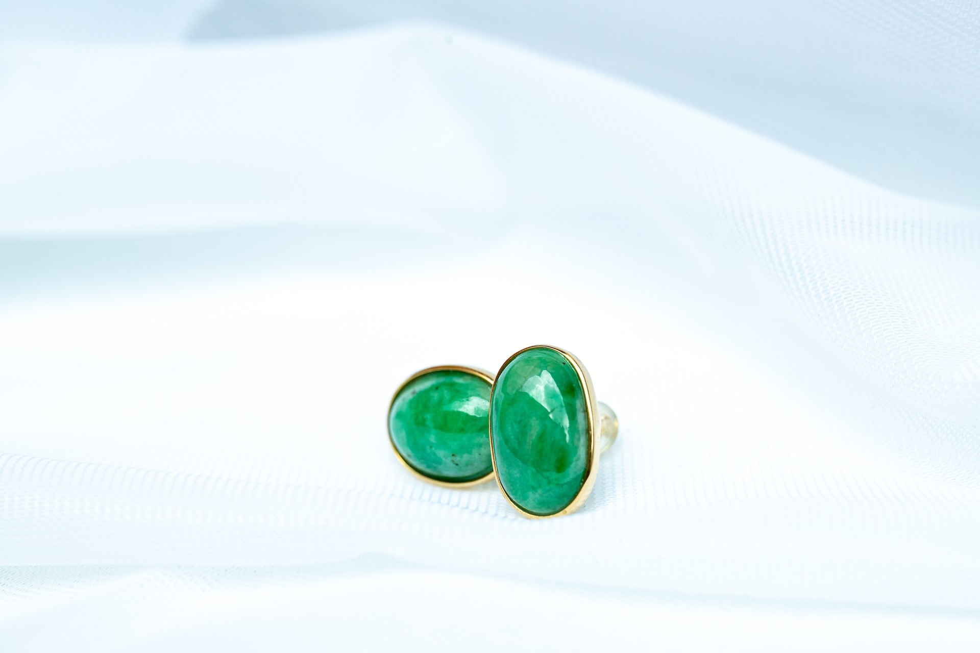aventurine gemstone rings on white background