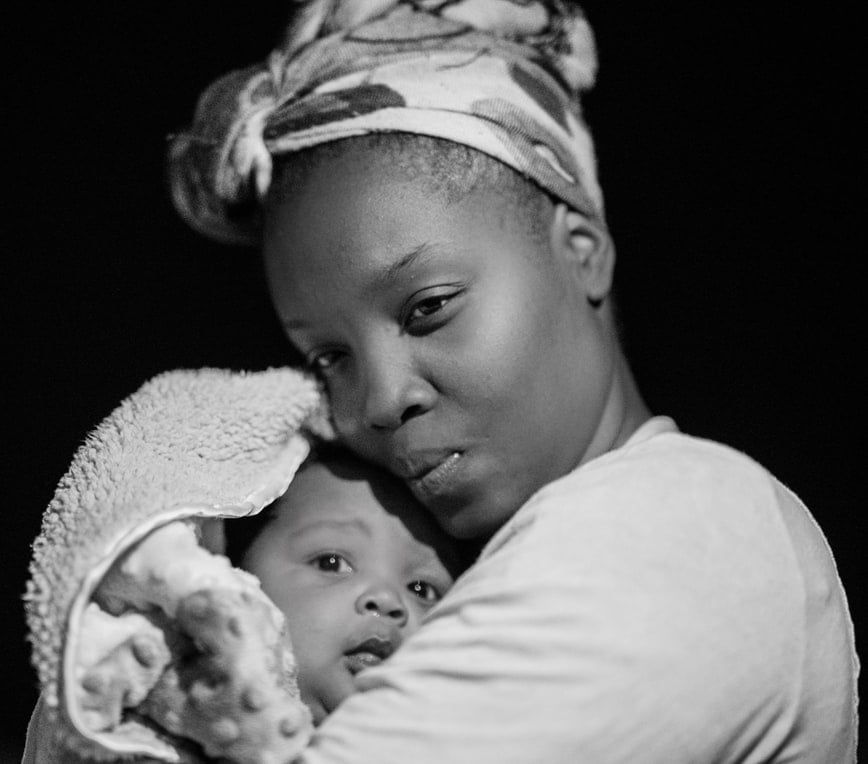 Mom holding baby boy