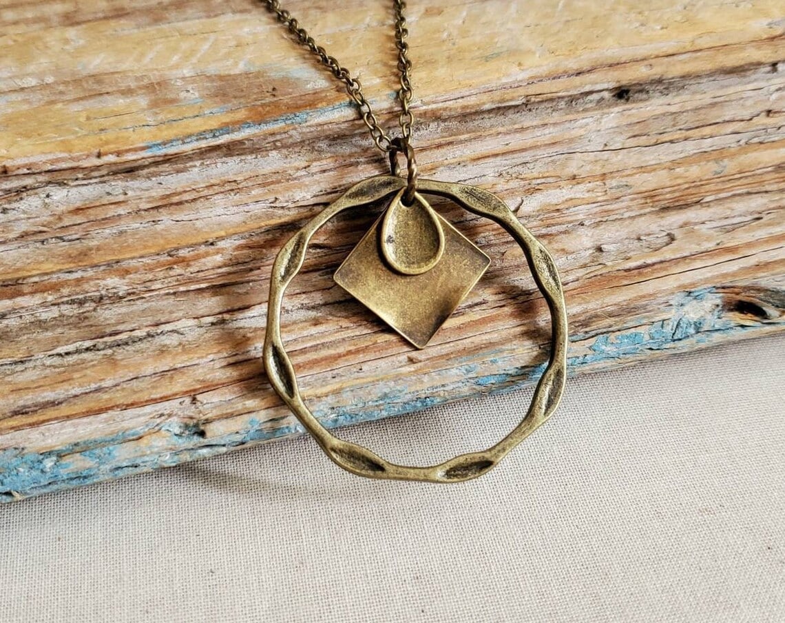 brass patina pendant