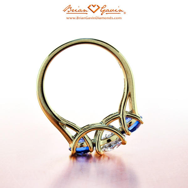Three stone high setting engagement ring