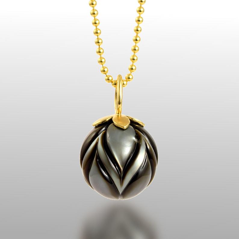 Carved pearl necklace