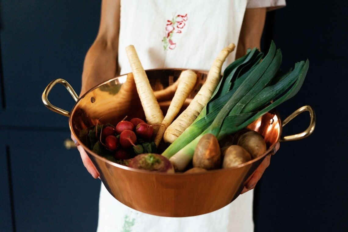 vegetables in large copper pot