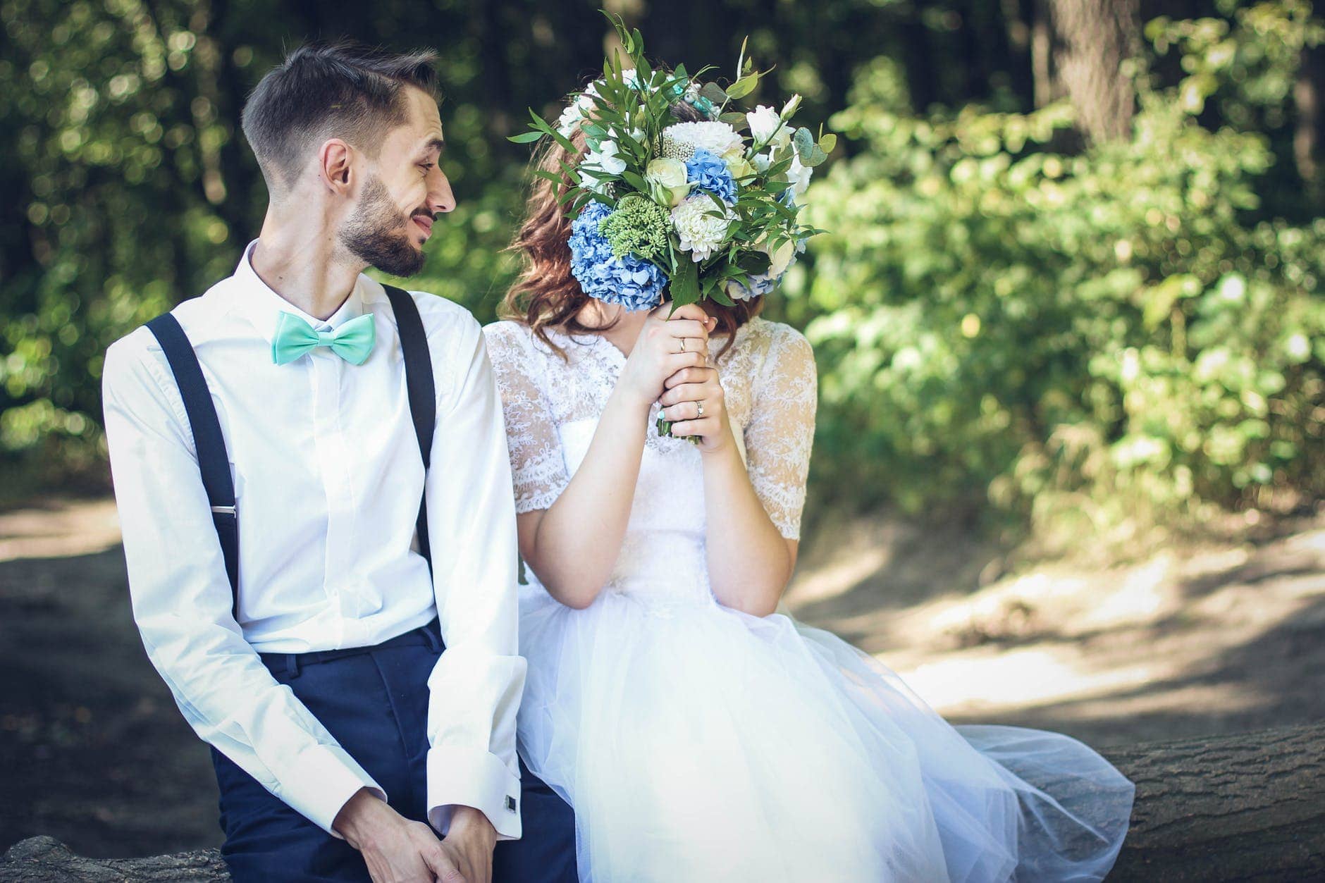 Couple sitting together on bench