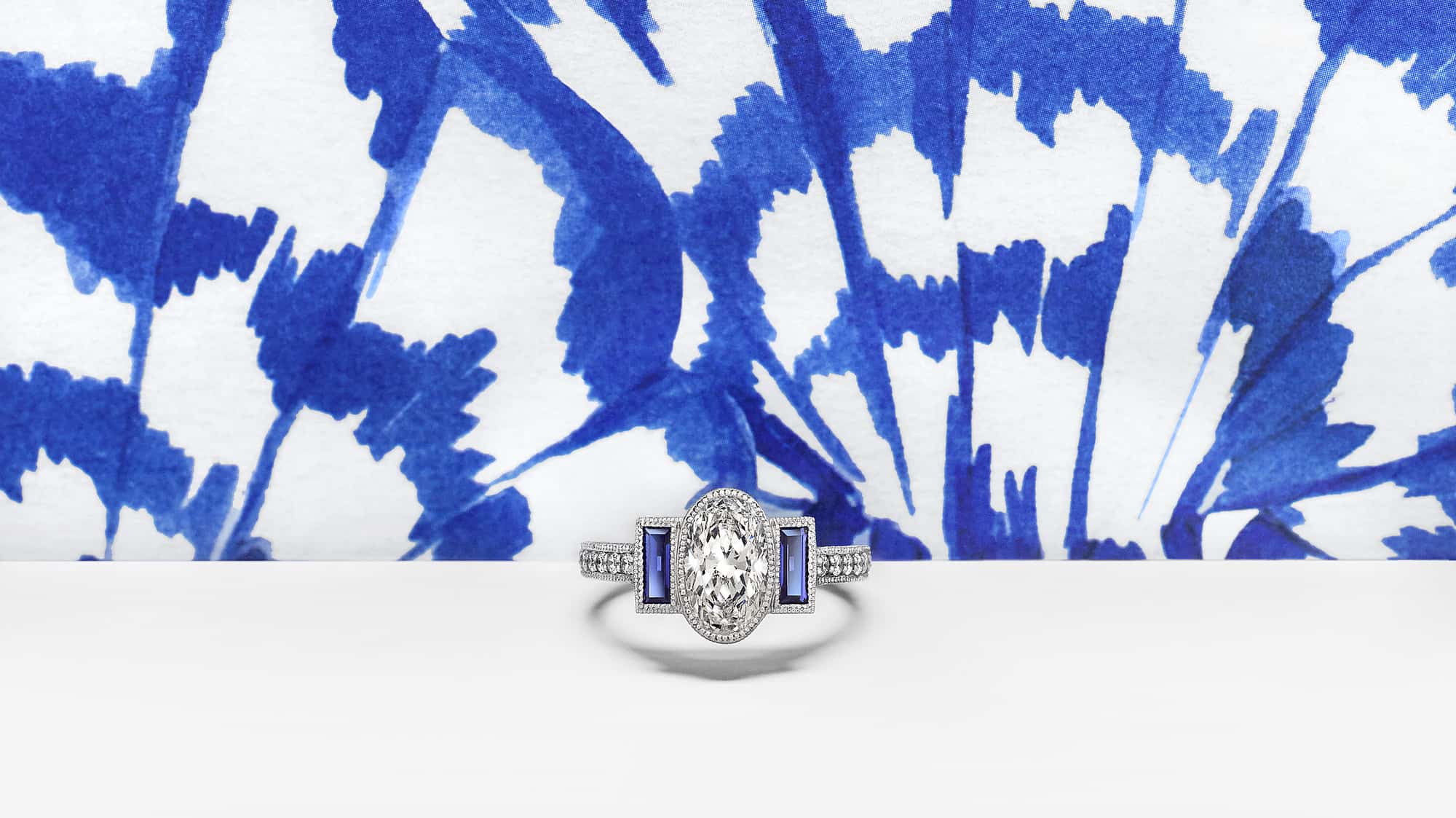 Diamond engagement ring with blue background