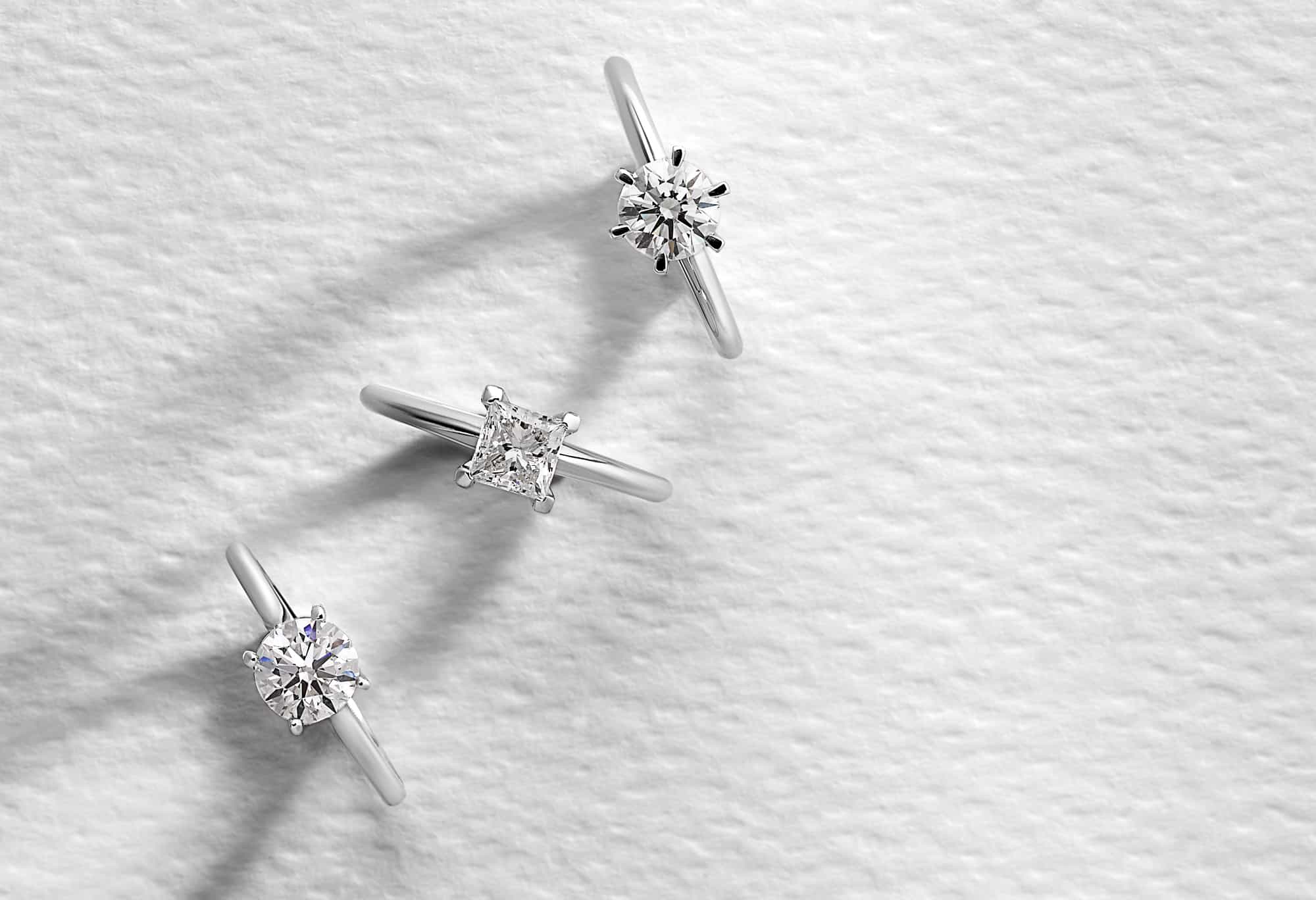Diamond engagement rings with round and princess shape diamonds