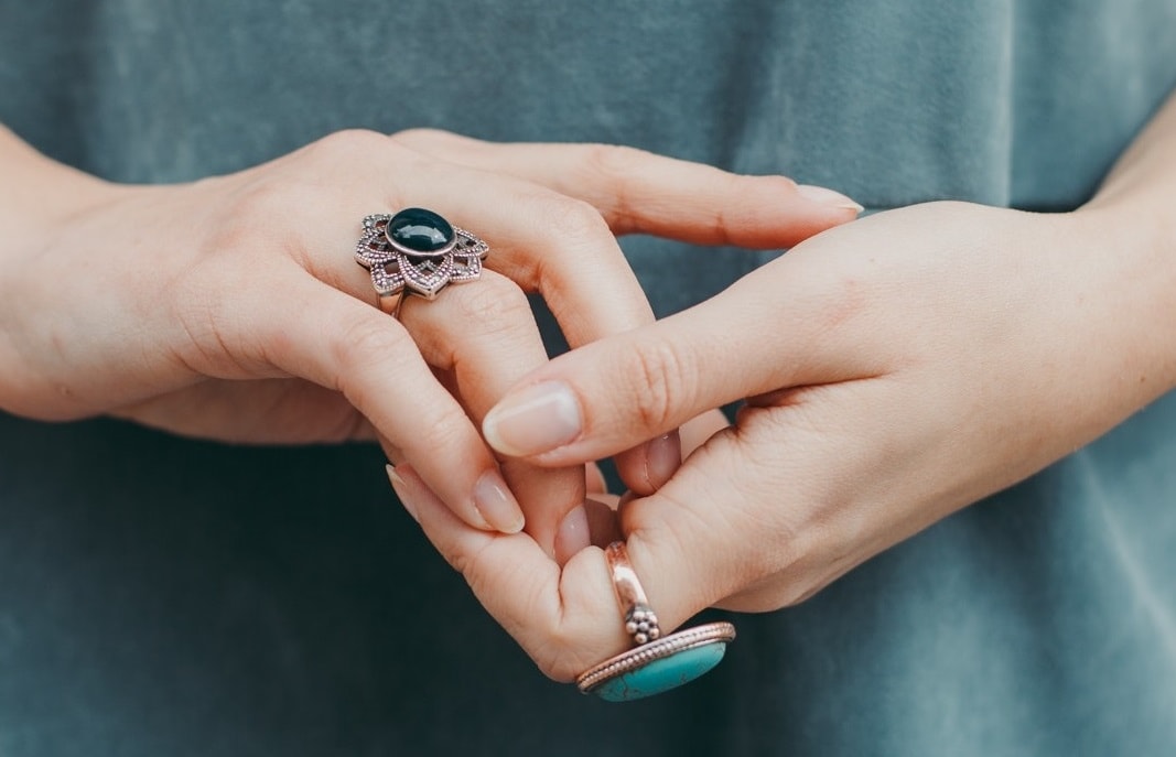 Girl's hand wearing rings close up