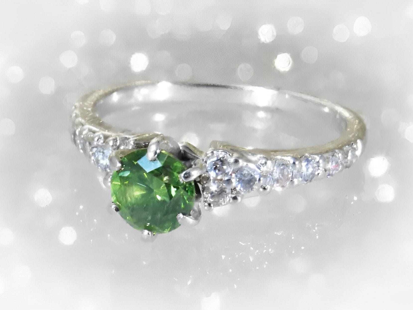 emerald and diamond engagement ring