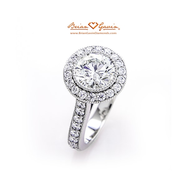 Hearts and arrows diamond engagement ring in halo setting