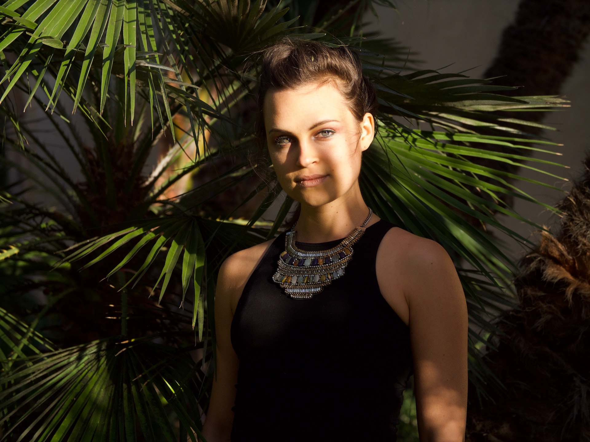 girl with large bib necklace
