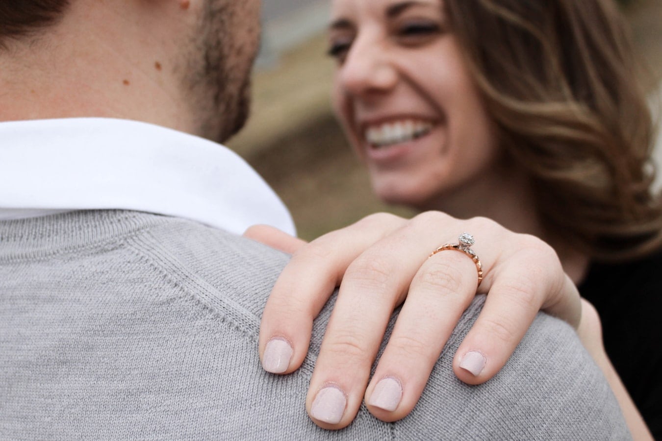 Bride wearing k color engagement ring