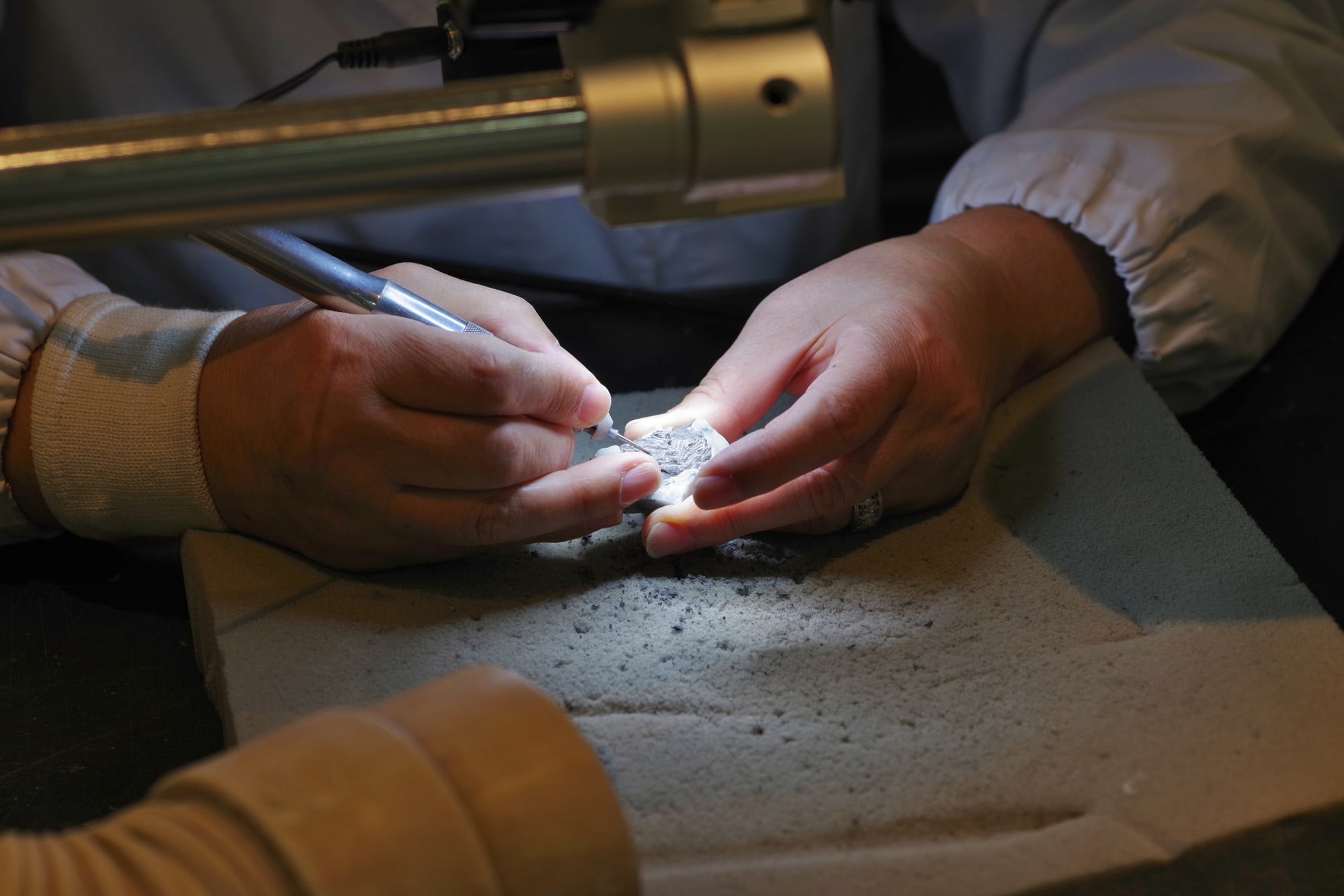 Man crafting jewelry