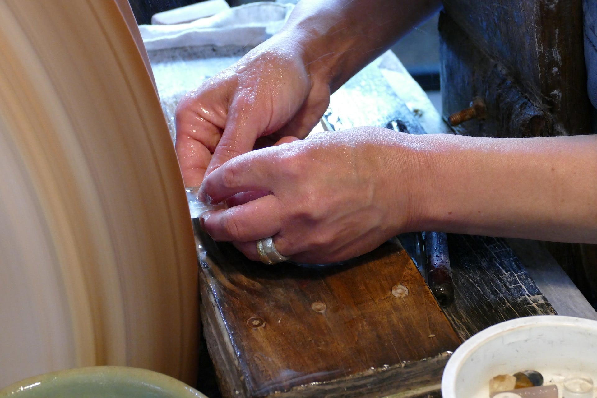 Man polishing a rough diamond
