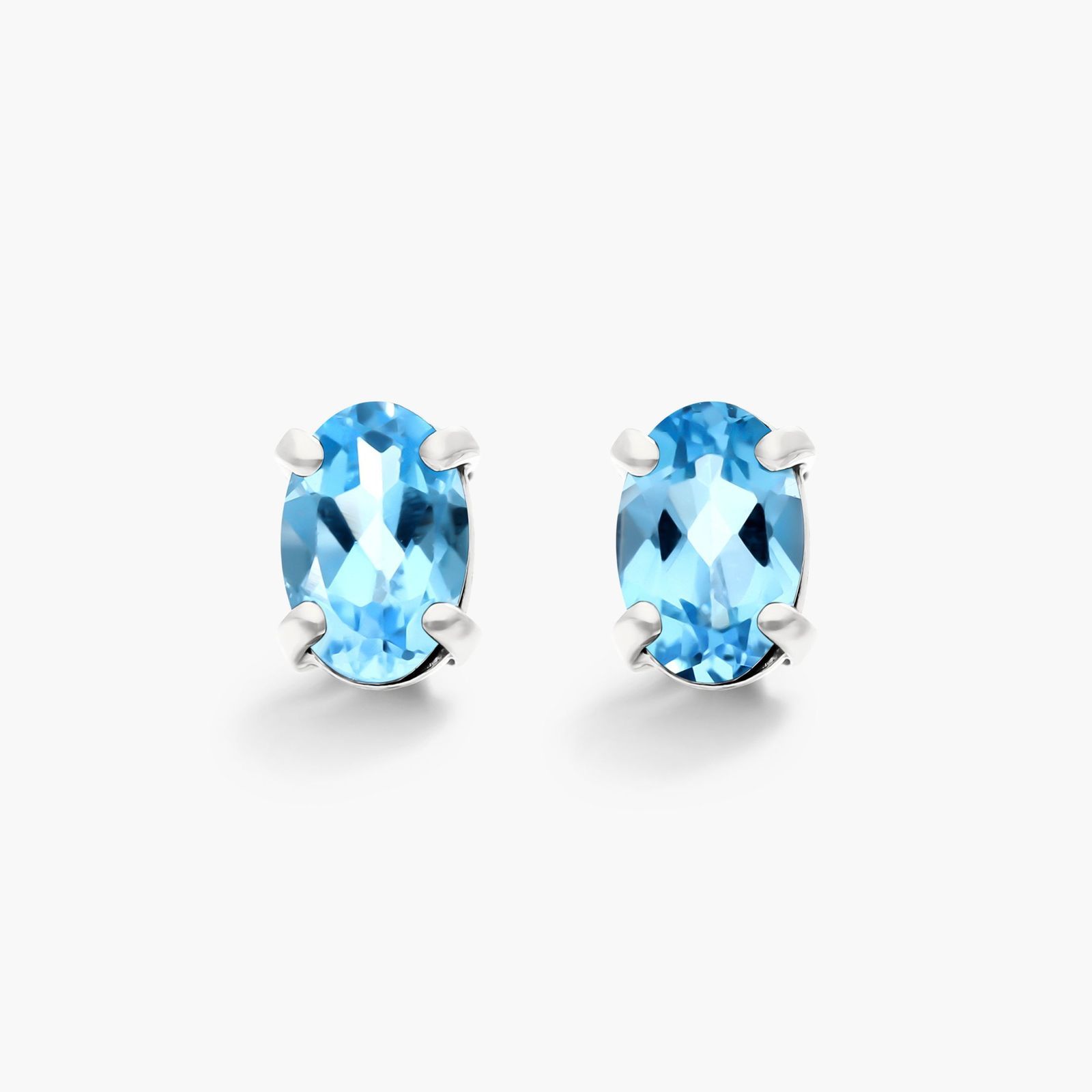 14K White Gold Oval Blue Topaz Earrings