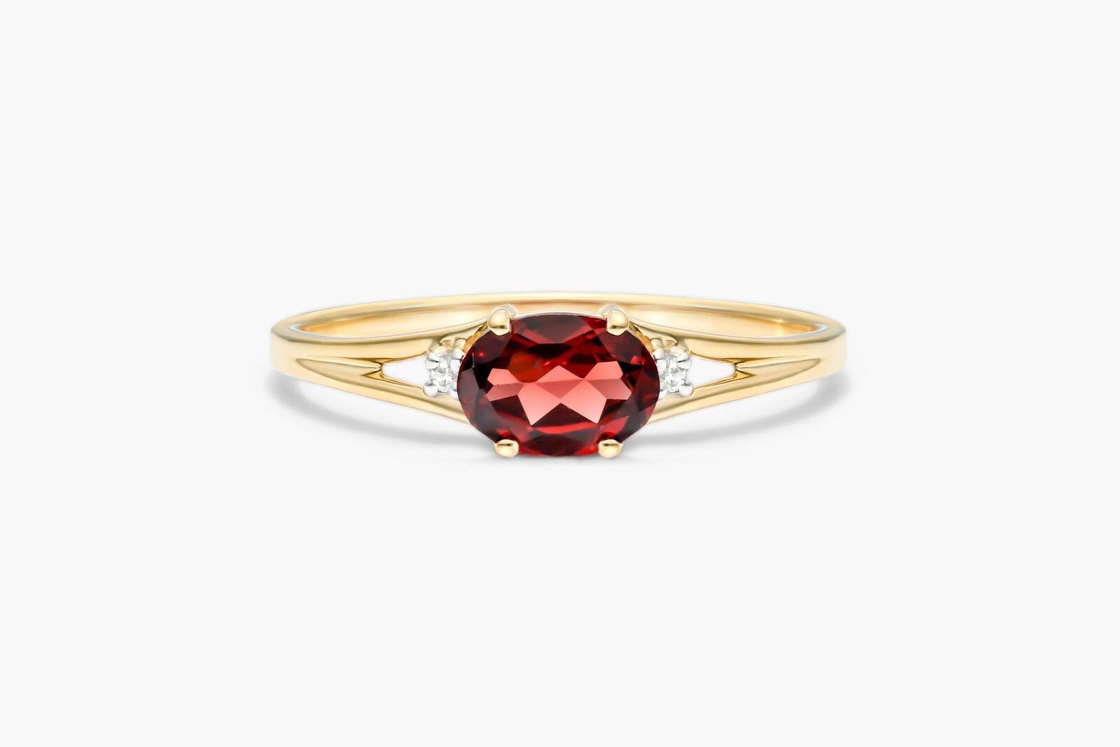 Oval Garnet And Diamond Ring