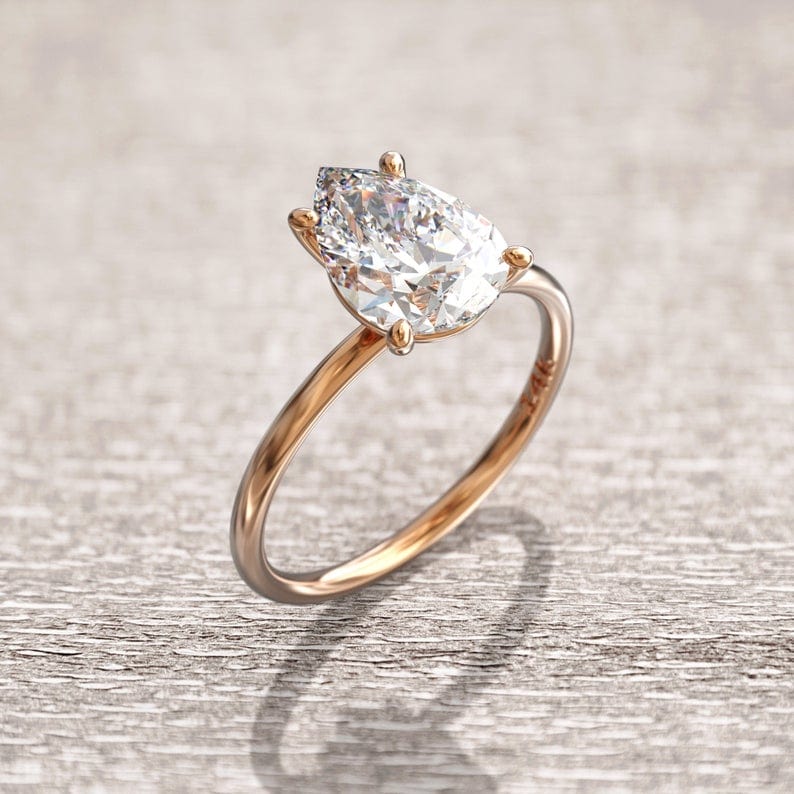 Pear shaped moissanite ring