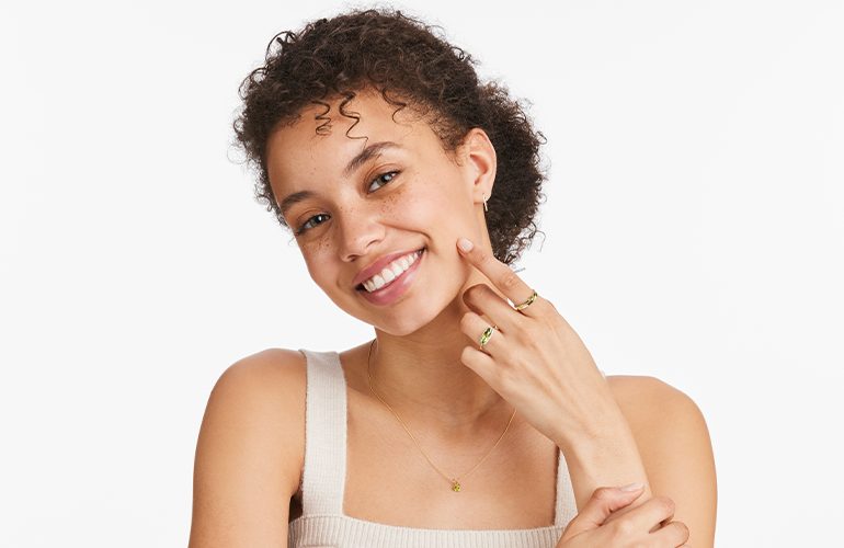 girl with peridot jewelry