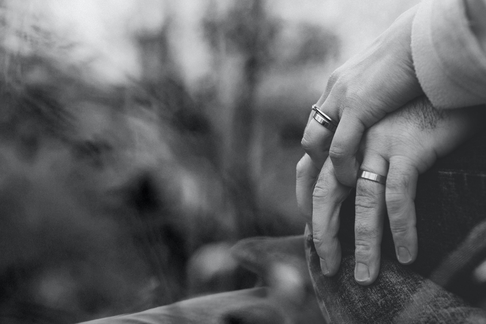 mand-and-womans-hands-with-rings