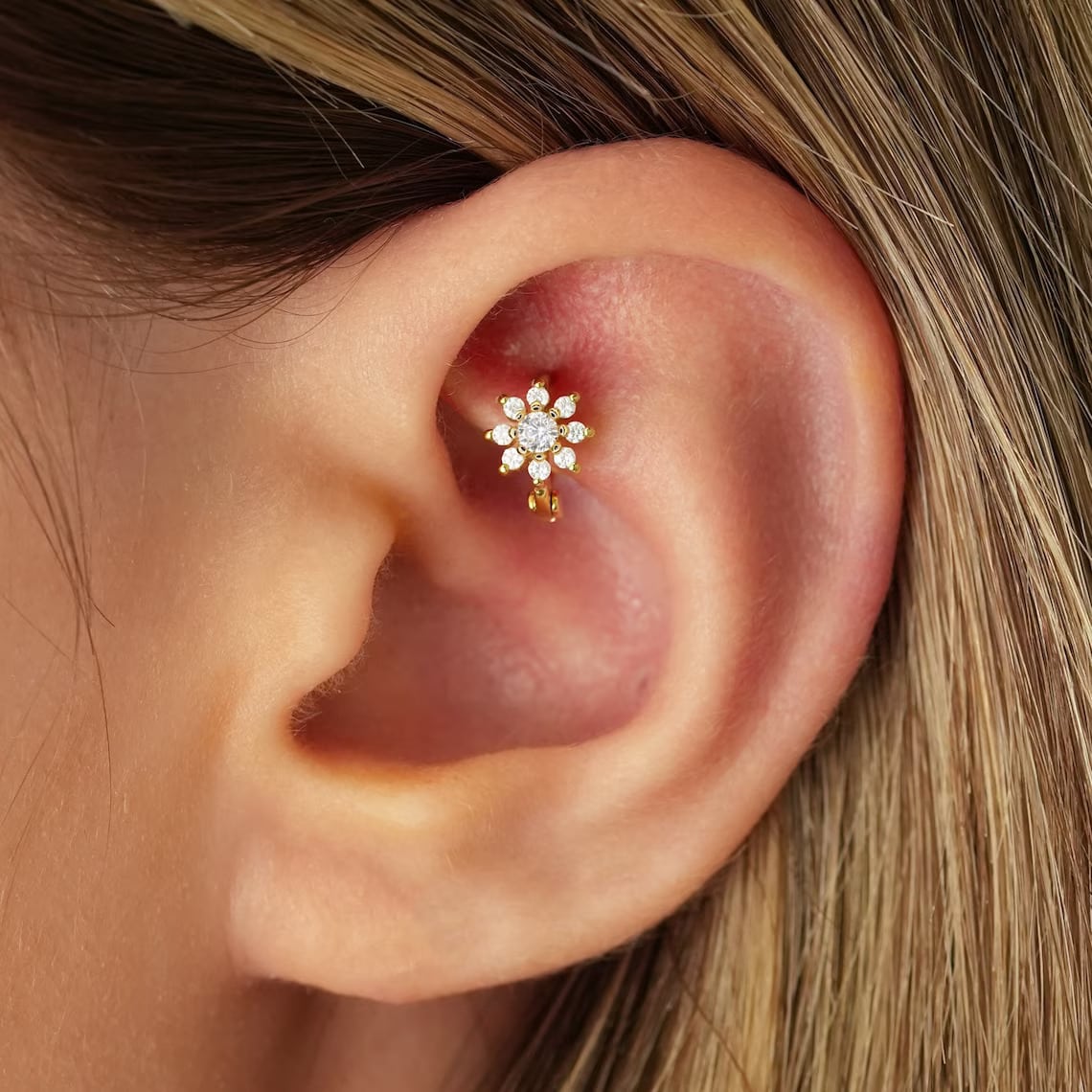 rook hoop earring on the ear