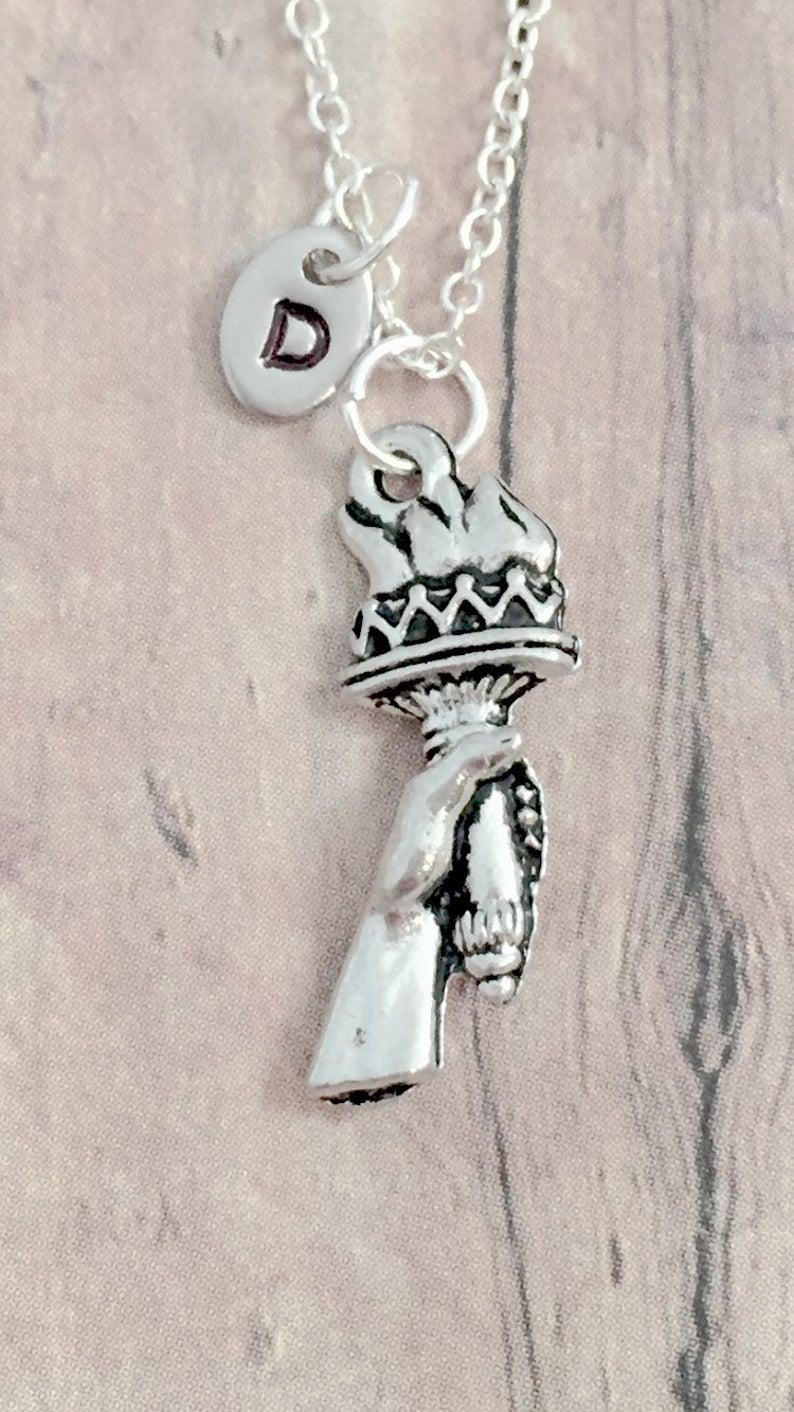 Torch flame pendant charm