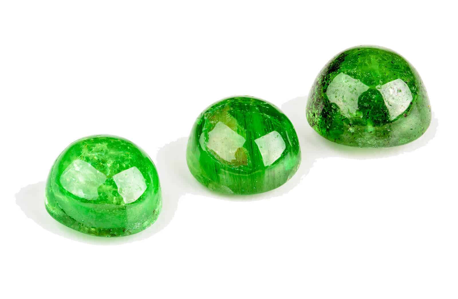 Three Tsavorite garnets cabochons in bright green