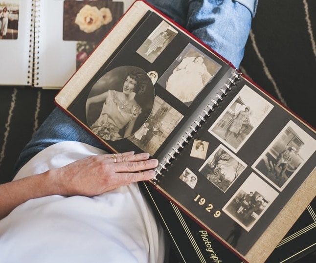 Woman looking at old pictures