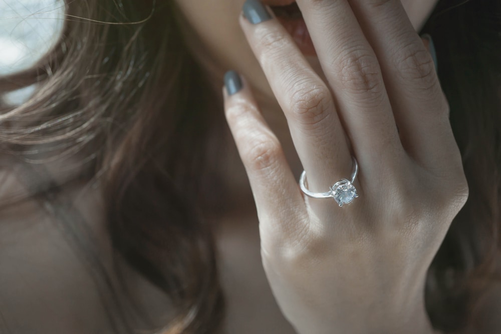 Girl wearing white gold ring