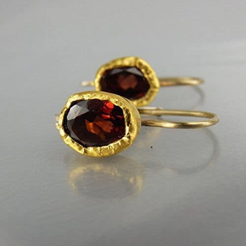 yellow gold bezel set garnet earrings