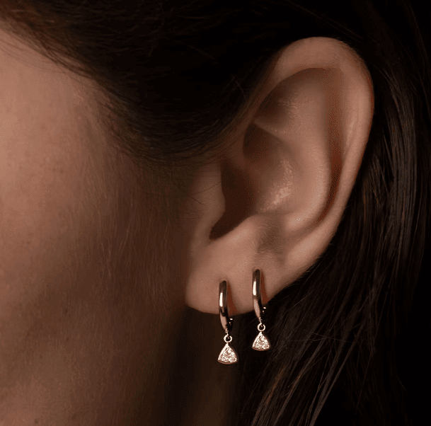 diamond bezel drop huggie hoops on the ear