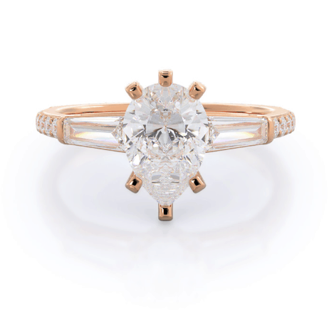 Three stone pear ring with clarity