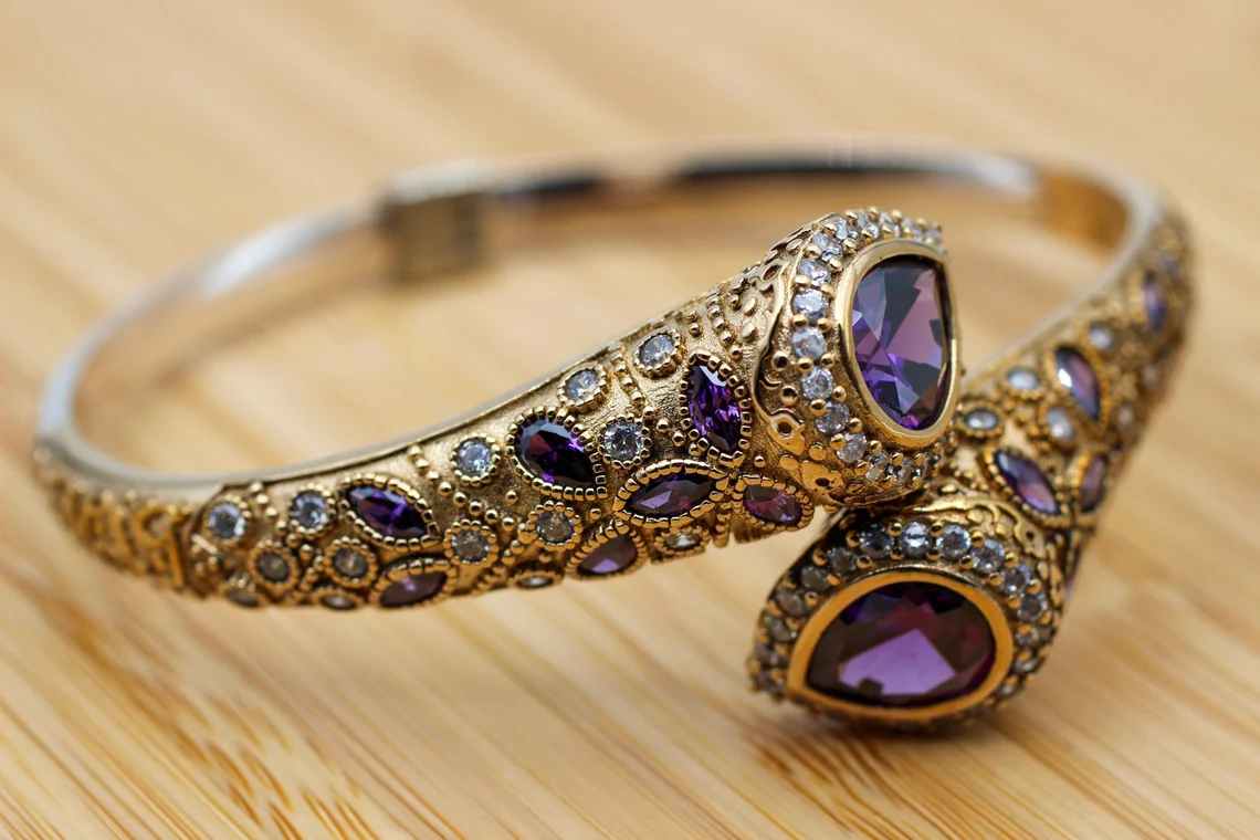 amethyst cuff in gold detailed setting