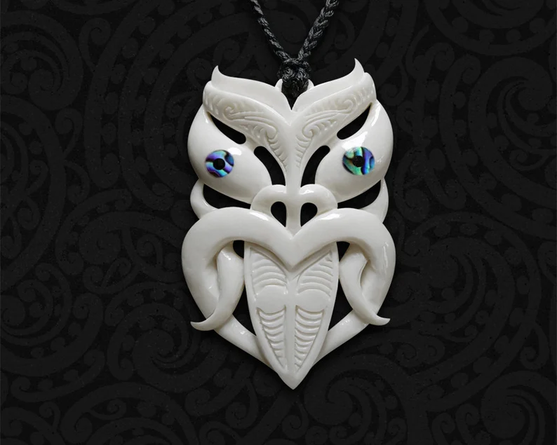 Bone Carving Wheku Pendant