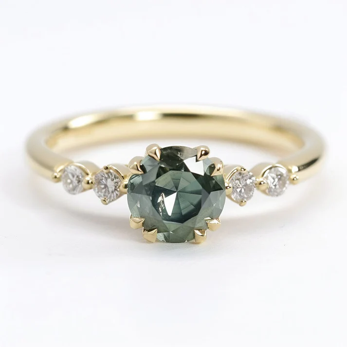 green sapphire and diamond engagement ring