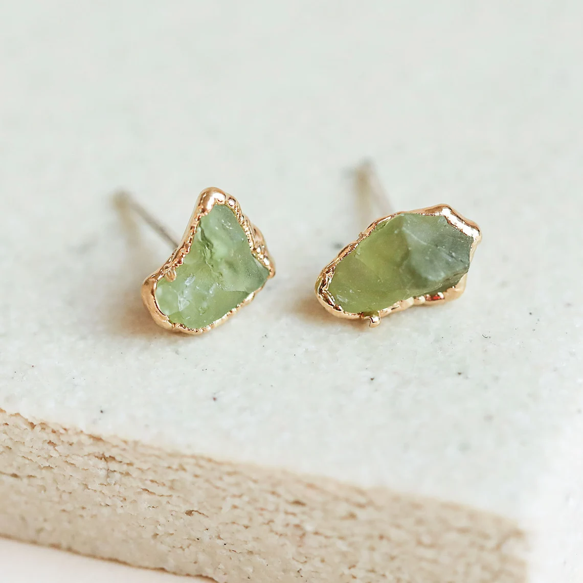 raw peridot earrings