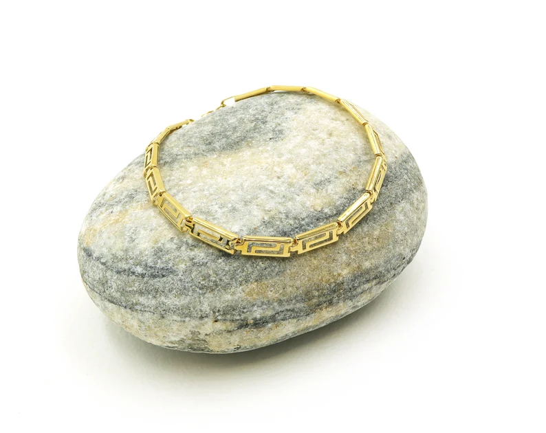 Solid gold meander bracelet