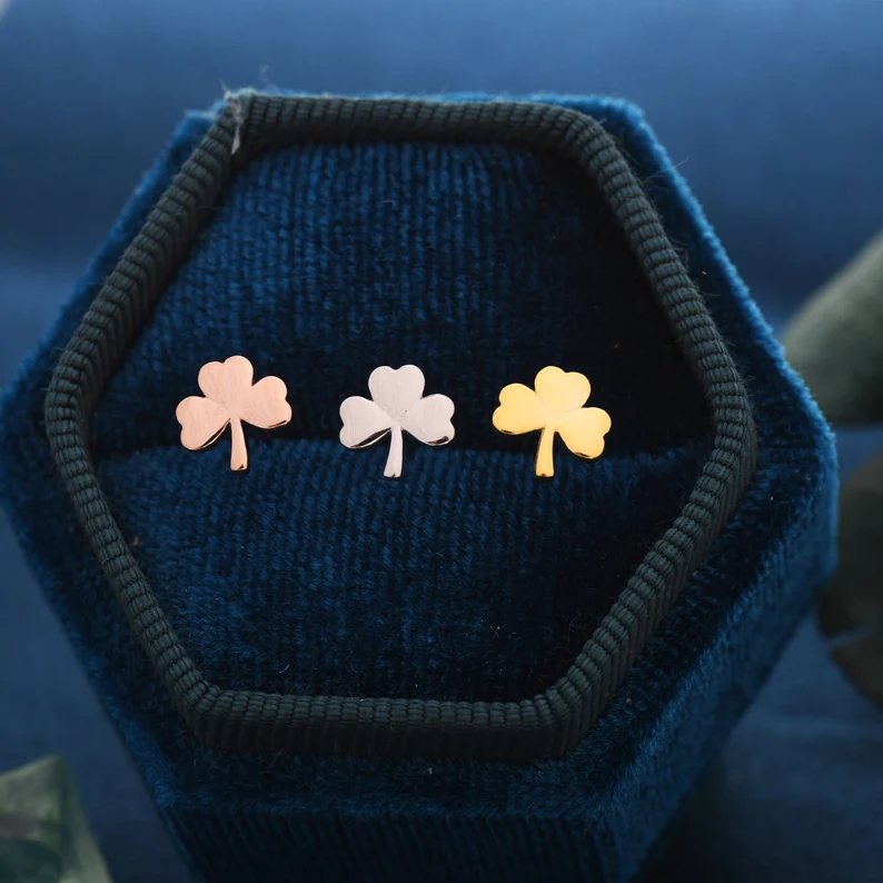 shamrock stud earrings in a jewelry box