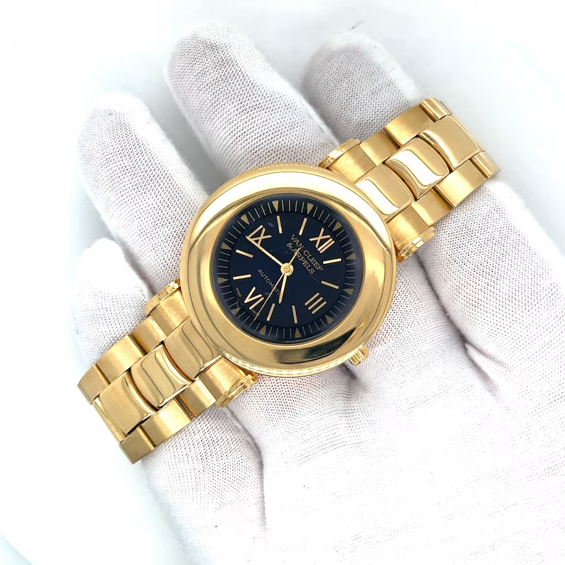 van cleef arpels solid gold case watch